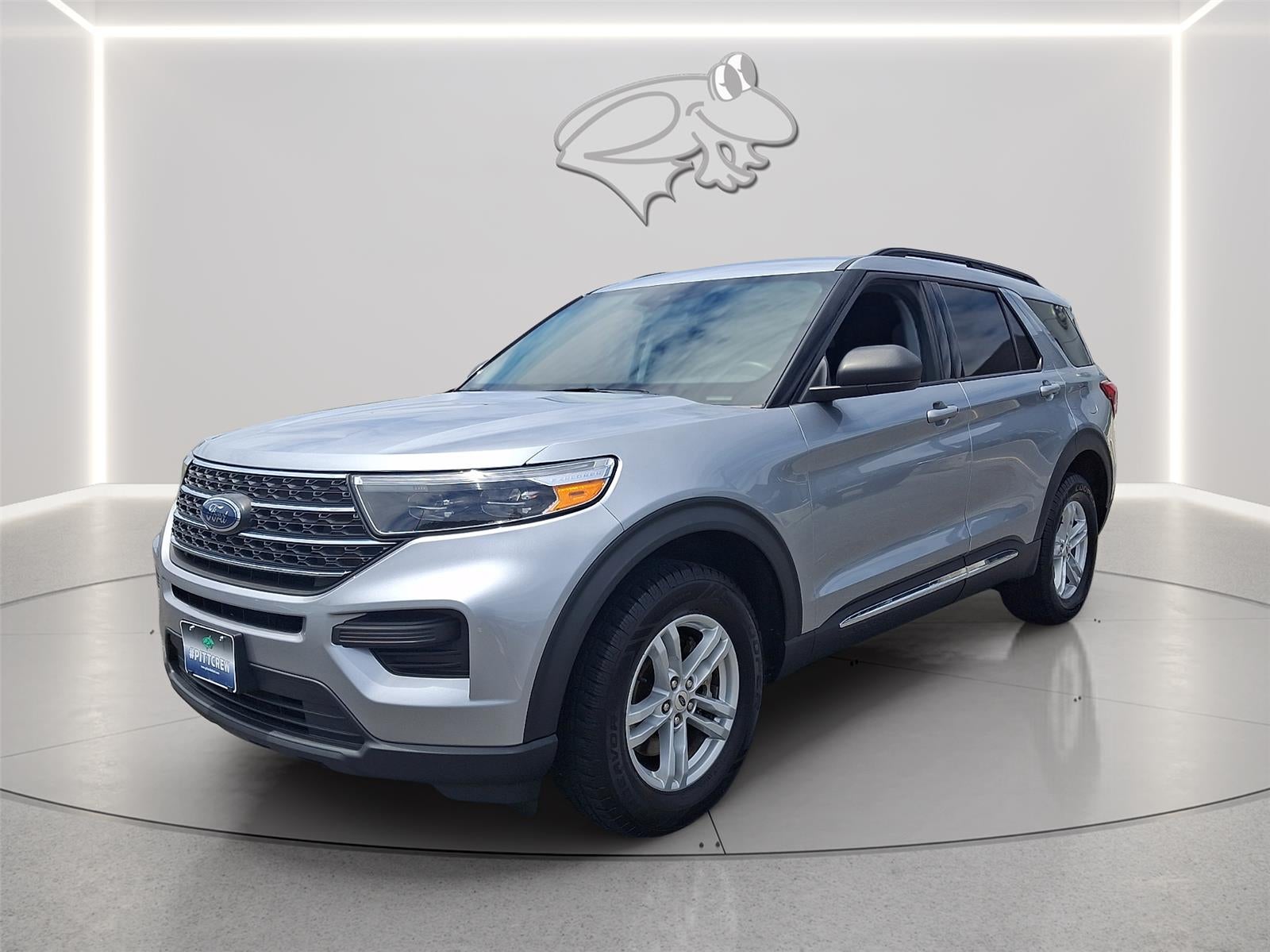 2022 Ford Explorer XLT in Iconic Silver — front three-quarter view